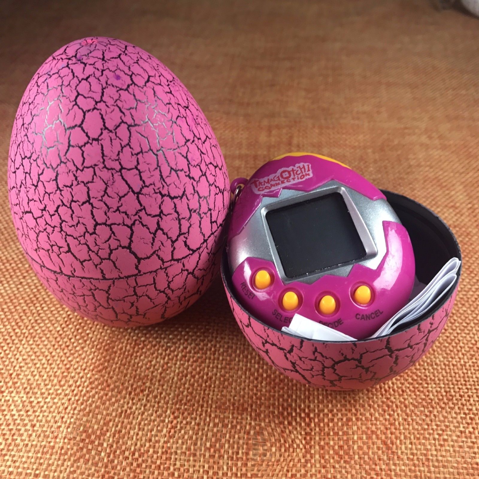 Фото 3 Игрушка электронный питомец Тамагочи в Яйце Динозавра UFT Eggshell Game Pink